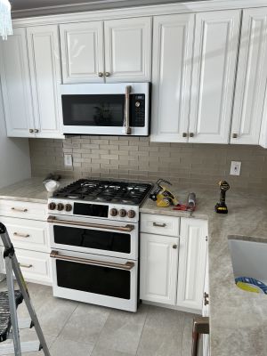 Kitchen cabinet painting in Lawrence